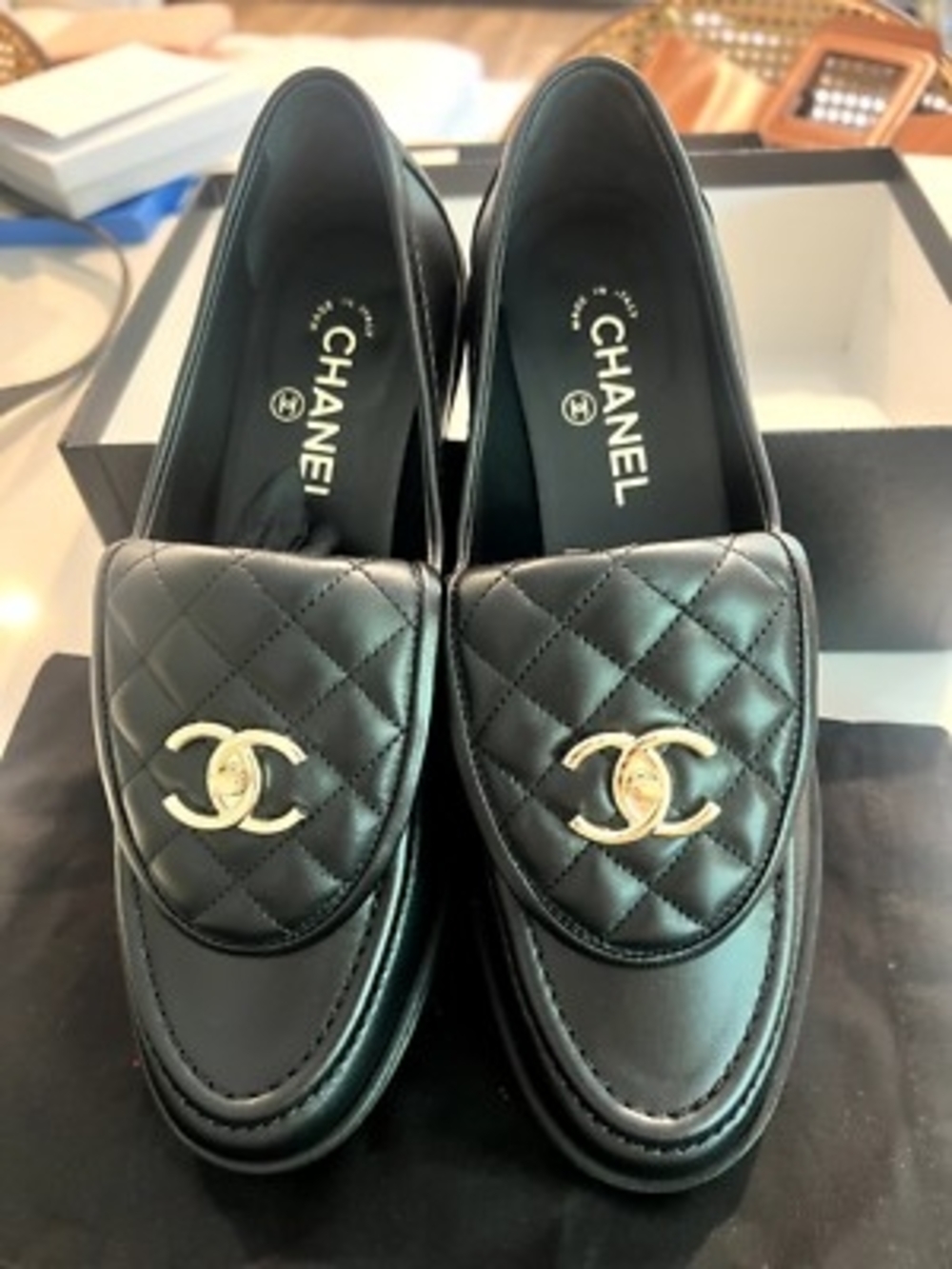 CHANEL Black Leather Slip-On Shoes with Gold Logo Insole